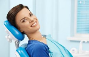 Woman Smilinf in Dental Chair Atlanta, GA