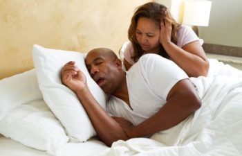 woman cannot withstand man's snoring in bed