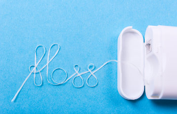 dental floss arranged in word floss